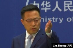 Chinese Foreign Ministry spokesperson Zhao Lijian responds during the daily media presser in Beijing on November 19, 2021.