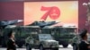 Chinese military vehicles carrying weapons including a nuclear-armed missile during a parade to commemorate the 70th anniversary of the founding of Communist China in Beijing, Tuesday, Oct. 1, 2019. (Associated Press)