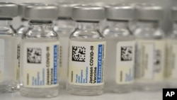 Vials of Johnson & Johnson COVID-19 vaccine sit in the pharmacy of National Jewish Hospital for distribution on March 6, 2021, in east Denver. (AP Photo/David Zalubowski)