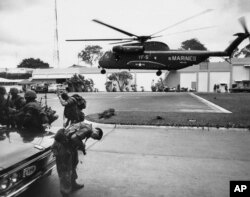 A helicopter lifts off from the U.S. embassy in Saigon during the evacuation of authorized personnel and civilians on April 29, 1975.