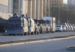 Belarusian law enforcement vehicles on a street in Minsk, March 25, 2021.