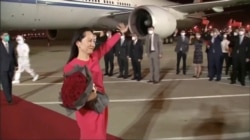 Huawei Technologies Chief Financial Officer Meng Wanzhou waves upon arriving from Canada at Shenzhen Baoan International Airport, in Shenzhen on September 25, 2021. (CCTV via Reuters)
