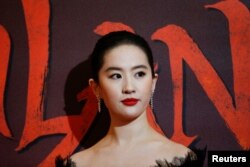 Cast member Yifei Liu poses at the European premiere for the film "Mulan" in London, U.K. March 12, 2020. REUTERS/Henry Nicholls